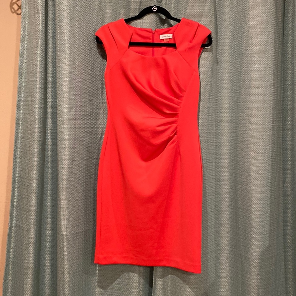 Coral dress with flattering detail